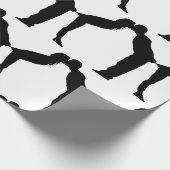 Huwelijkskoppel zoent inpakpapier (Hoek)