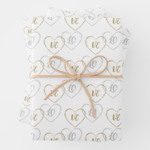 Huwelijksmonogrammen, zilveren en gouden hartcharm inpakpapier vel