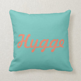 Hygge comfort in het Deens in cursief schrift Kussen