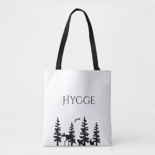 Hygge met cartoonbomen en -dieren in zwart tote bag