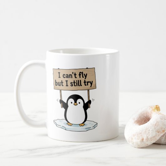 “I can’t fly but I still try” cute penguin Koffiemok (Met donut)