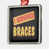 I OVERVIGDE BRACES METALEN ORNAMENT (Links)