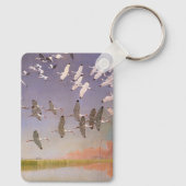 Ibis-kudde over watergebieden, vogels sleutelhanger (Achterkant)