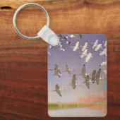 Ibis-kudde over watergebieden, vogels sleutelhanger (Voorkant)