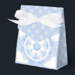 Ice blue snowflake bedankdoosjes<br><div class="desc">In winter,  these ice-blue snowflakes fall on my imaginary world. They have 7 branches,  soft blue tones and rhinestones embedded inside. For anyone who loves blue pastels and snowy holidays.</div>