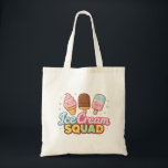 Ice Cream Squad Cute Cartoon Popsicle Tote Bag<br><div class="desc">Bring sweet summer fun to life with this playful “Ice Cream Squad” design featuring adorable cartoon-style frozen treats, including soft serve, chocolate-coated, and colorful popsicles. The cheerful characters, bright pastel colors, and bubbly typography create a fun, happy aesthetic that instantly spreads positive vibes. This design captures friendship, summer adventures, and...</div>