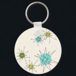 Iconic Atomic Starbursts Button Sleutelhanger<br><div class="desc">Deze Iconische atoomStarstocht barst het patroon van de Sleutelhanger van de Button uit met iconische atomaire sterrenbursts. Dat klopt! De oude school, crèmekleurige achtergrond met gouden spugen is de perfecte achtergrond voor de levendige turquoise, het kalkselderij en kitschy peren groene cirkels. De vlekken van kleur worden sporadisch geplaatst in diverse...</div>