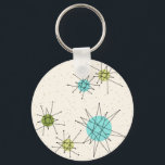 Iconic Atomic Starbursts Button Sleutelhanger<br><div class="desc">Deze Iconische atoomStarstocht barst het patroon van de Sleutelhanger van de Button uit met iconische atomaire sterrenbursts. Dat klopt! De oude school, crèmekleurige achtergrond met gouden spugen is de perfecte achtergrond voor de levendige turquoise, het kalkselderij en kitschy peren groene cirkels. De vlekken van kleur worden sporadisch geplaatst in diverse...</div>