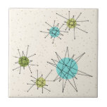 Iconic Atomic Starbursts Small Ceramic Tile Tegeltje<br><div class="desc">Deze Iconische atoomstoot barst het kleine keramische tegel patroon met iconische atomaire sterrenbursts. Dat klopt! De oude school, crèmekleurige achtergrond met gouden spugen is de perfecte achtergrond voor de levendige turquoise, het kalkselderij en kitschy peren groene cirkels. De vlekken van kleur worden sporadisch geplaatst in diverse grootte met het bekleden...</div>