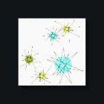 Iconische atomaire sterbursts omwikkeld doek canvas afdruk<br><div class="desc">Dit iconische Atomic Starbursts Wrapped Canvas patroon beschikt over iconische atoomstarbursts. Dat klopt! De oude school, crèmekleurige achtergrond met gouden spikkels is de perfecte achtergrond voor de levendige turquoise, rustgevende selderij en kitschy peer groen gekleurde cirkels. De vlekken van kleur worden sporadisch geplaatst in verschillende maten met bedekkende zwarte V-vormige...</div>