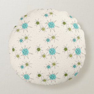 Iconische atoomstarbursts rond kussen