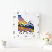 Idaho vorm met berg en wilde bloemen vierkante klok (Huis)