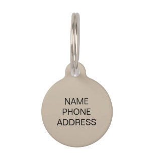 Identificeer beige zwarte-hondenhuisnaam aan huisdierpenning