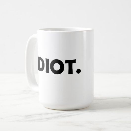 Idioot. Grappig ontwerp Koffiemok (Voorkant links)