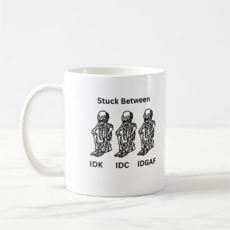 IDK, IDC en IDGAF met skeletten gemaakt op een Koffiemok