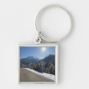 Idyllische lege weg door een winterlandschap, 2 sleutelhanger