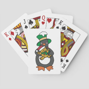 Ierse pinguïn houdt kerst-teddybeer vast pokerkaarten