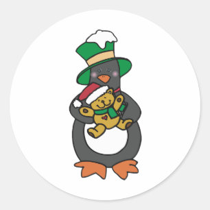 Ierse pinguïn houdt kerstteddybeer vast ronde sticker