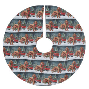 Ierse rode setter hond in sneeuw kerst kerstboom rok