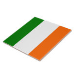 Ierse vlag tegeltje<br><div class="desc">6" x 6" vierkante keramische tegel met een afbeelding van de Ierse nationale vlag, in Ierland vaak aangeduid als 'de driekleur' en elders als de driekleur van Ierland is een verticale driekleur van groen, wit en sinaasappel. Bekijk het hele St. Patrick’s Day Tegel collectie in de rubriek FEESTDAGEN. Bekijk het...</div>