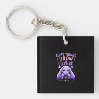 Iets groeit in stilte sleutelhanger