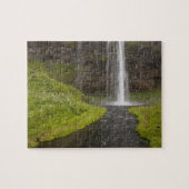 IJsland. Mensen op pad achter Seljalandsfoss Legpuzzel (Horizontaal)