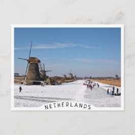 IJsschaatsen langs de windmolens in de winter Briefkaart