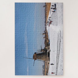 IJsschaatsen langs de windmolens in de winter Legpuzzel
