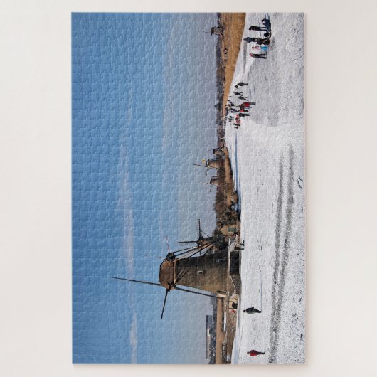 IJsschaatsen langs de windmolens in de winter Legpuzzel (Verticaal)