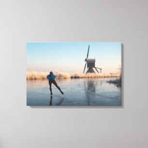 IJsschaatsen voorbij windmolen en rietdoek Canvas Afdruk
