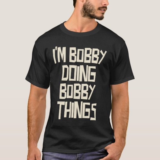 Ik ben Bobby die Bobby dingen doet T-shirt (Voorkant)