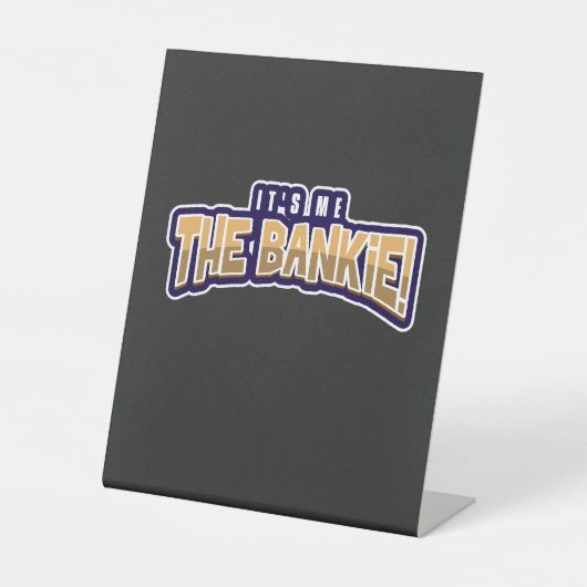 IK BEN DE BANKIE RECLAMEBORD MET VOETSTUK (Voorkant)