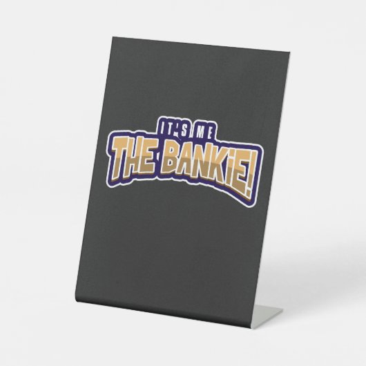IK BEN DE BANKIE RECLAMEBORD MET VOETSTUK (Voorkant)