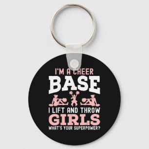Ik ben een cheerleader die een meisje tilt en gooi sleutelhanger