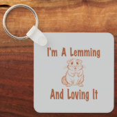 Ik ben een lemmet en hou ervan om tekst in bruin t sleutelhanger (Voorkant)