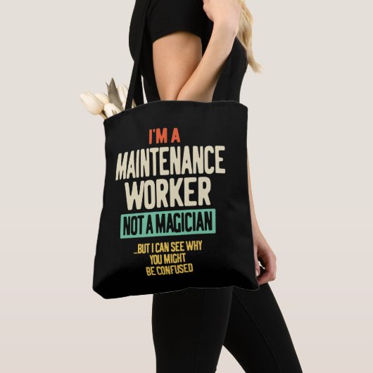 Ik ben een onderhoudswerker, geen tovenaar tote bag (Dichtbij)