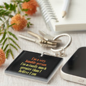 Ik ben een zeer bescheiden persoon sleutelhanger (Voorkant Rechts)