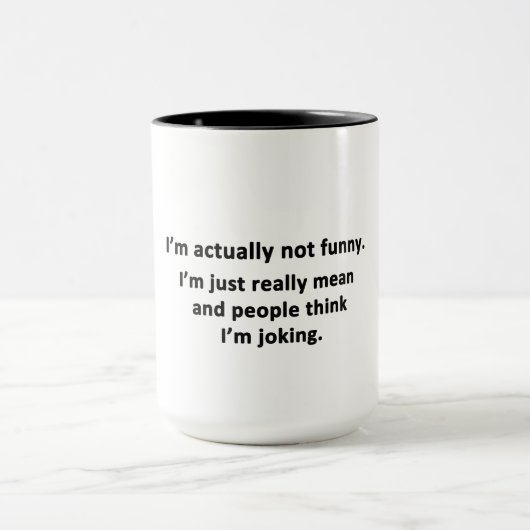 Ik ben eigenlijk niet grappig. mok (Midden)