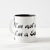 Ik ben geen bedrieger tweekleurige koffiemok (Voorkant links)