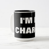 IK BEN IN HANDEN! TWEEKLEURIGE KOFFIEMOK (Voorkant links)