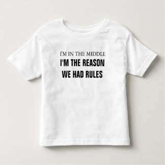 Ik ben in het midden omdat we regels hadden kinder shirts