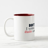 Ik ben me niet schuldig tweekleurige koffiemok (Links)