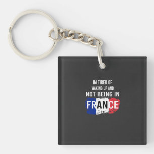 Ik ben moe van wakker worden en niet in Frankrijk Sleutelhanger