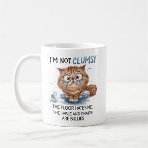 Ik ben niet onhandig, de vloer haat me koffiemok