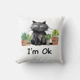 Ik ben ok, rare zwarte kat met planten kussen