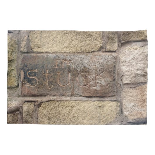 "Ik ben Stuck" een andere steen in de muur Kussensloop (Achterkant)