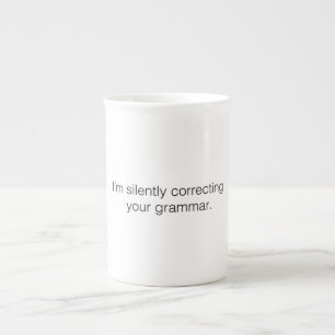 Ik corrigeer je grammatica grappig. porselein kop