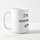 Ik corrigeer je grammatica. koffiemok (Links)