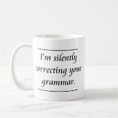 Ik corrigeer je grammatica..png koffiemok (Links)