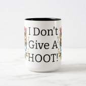 Ik geef geen hoepeltje. tweekleurige koffiemok (Center)